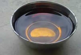 bowl containing dark coloured liquid